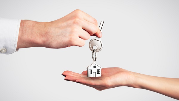 Handing Over the Key from a New Home