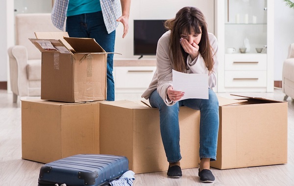 Young couple receiving foreclosure notice letter